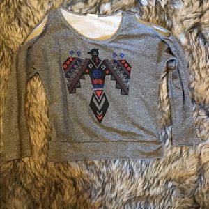 Sweater with cut out shoulders